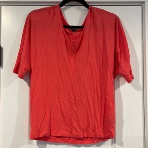 Orange Express short sleeve shirt.